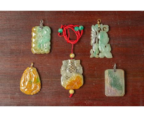 A GROUP OF FIVE CARVED JADE PENDANTS
Various modelled, one example with fish and lotus, pierced vase, rectangular plaque shap