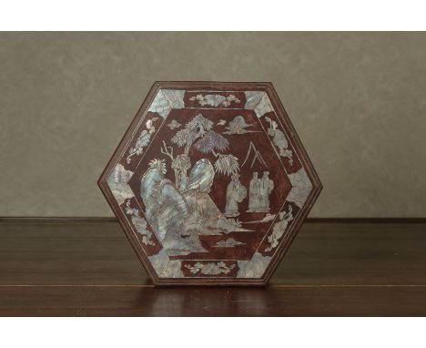 A  HEXAGONAL MOTHER OF PEARL INLAID BOX
The top decorated with figures in a landscape
22cm diameter
Condition: For a conditio