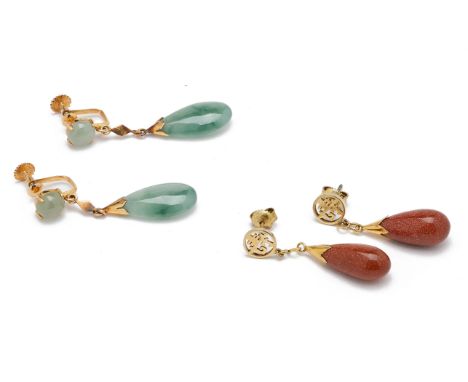 TWO PAIRS OF DROP EARRINGS
Comprising a pair of jade examples with pear shaped drops, marked 14k, with screw fitting; and a p