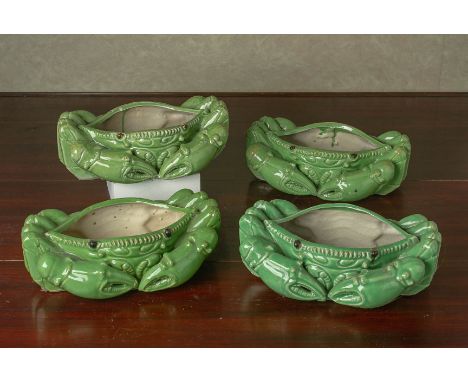 FOUR GREEN GLAZED CERAMIC MODELS OF CRABS
Four novelty planters in the form of crabs
14cm x 24cm
Condition: For a condition r
