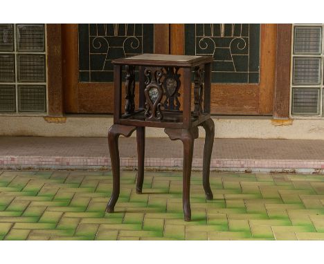 A MARBLE INSET AND CARVED BLACKWOOD SIDE TABLE
Square with inset marble top above an open shelf with marble inset supports, i