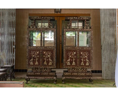 A PAIR OF LARGE MOTHER OF PEARL INLAID DISPLAY CABINETS Decorated with flower heads, vases of flowers, fruiting peach branche