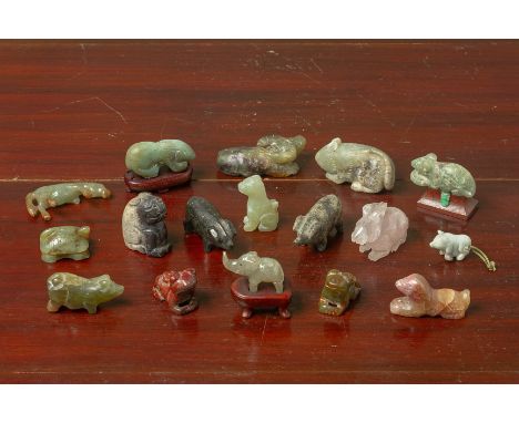 A LARGE QUANTITY OF JADE AND HARDSTONE ANIMALS
Including an elephant, pigs, rabbits etc.
Largest 6.5cm long
Condition: For a 