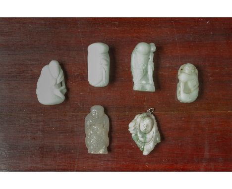 A GROUP OF SIX FIGURAL JADE CARVINGS
One example mounted as a pendant etc.
Largest 6cm long
Condition: For a condition report