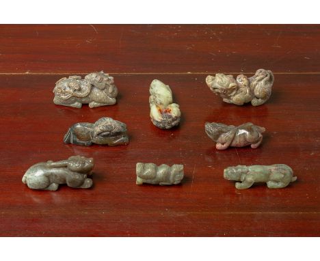 A GROUP OF EIGHT JADE CARVINGS OF MYTHICAL BEASTS
Of archaic style
Largest 8cm long
Condition: For a condition report or furt