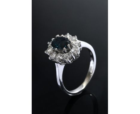 Weißgold 585 Entourage Ring mit Saphir (ca. 0.65ct) im Brillantkranz (zus. ca. 0.75ct/IF/W), 3,3g, Gr. 52