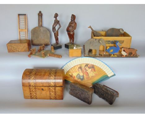 A box containing a quantity of treen items to include a Noah's Ark and animals, two Black Forest carved figures, a marquetry 