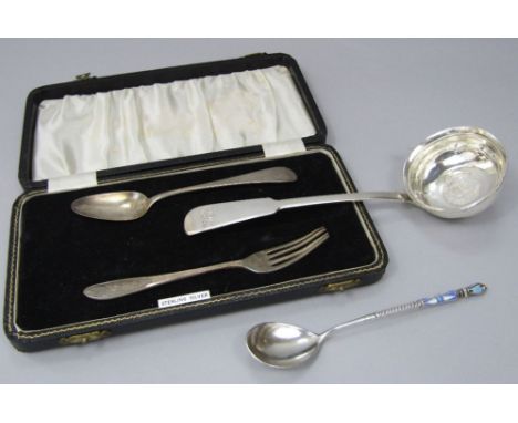 A George III silver sauce ladle, the bowl fitted with a silver coin, makers marks rubbed, London 1808; together with a furthe