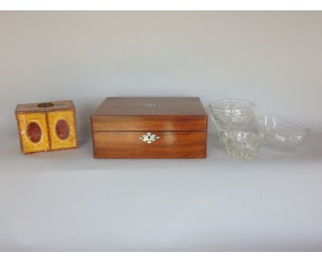 A 19th century rosewood and mother of pearl inlaid workbox, the hinged lid enclosing a fitted interior; together with three 1