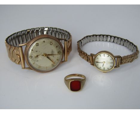 Gent's Accurist 9ct watch head upon a gold plated concertina strap, with 21 jewel movement, Champaign dial with Arabic numera