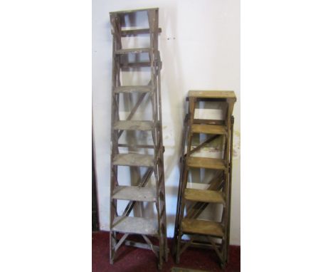 Two pairs of vintage pine step ladders (for display purposes only)