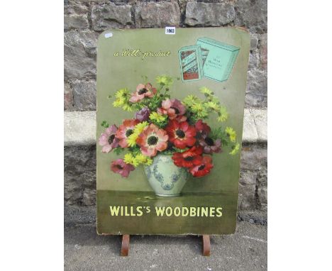 A vintage advertising sign printed and laid on hardboard, "Will's Woodbines", later mounted as a firescreen, 68cm max