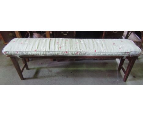 A pair of vintage stained pine refectory benches with plank seats raised on square tapered supports, 5ft long approx