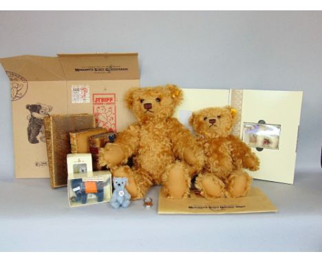 Two large mohair stuffed Steiff bears with button in the ear; together with a Steiff Club boxed polar bear, a further boxed S