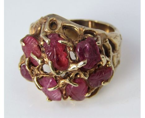 A vintage 14k ring set with carved rubies in naturalistic mount, size K, 11.3g