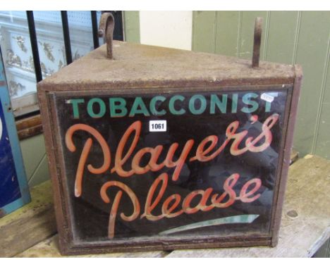 An unusual vintage wedge shaped illuminated street sign, the metal casework enclosing two glazed panels - "Tobacconist - Play