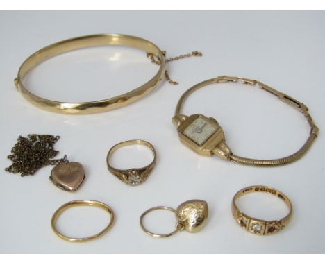 A mixed lot to include a vintage Verity ladies 9ct cocktail watch, three rings comprising 18ct diamond and ruby example, 22ct
