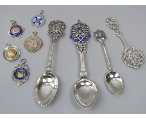 A 1930s Danish commemorative spoon by Johannes Siggaaard with attractive pierced and enamelled handle with an anchor, lions a