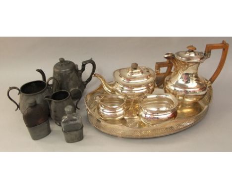 A Georgian style silver plated four piece boat shaped tea service comprising tea pot, water pot, milk jug and sucrier; togeth