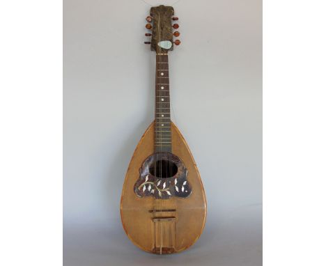 A bowl back mandolin with turtle shell and mother of pearl decoration