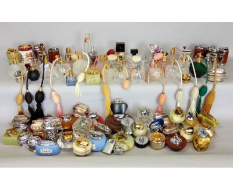 A large collection of vintage Ronson and other table lighters together with a collection of vintage perfume bottles