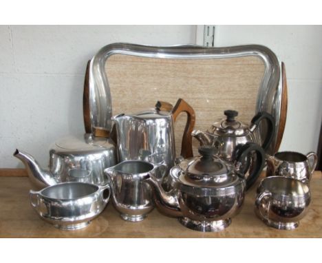 Five piece Picquot ware tea service conspiring tea pot, water pot, milk jug, sucrier and tray; together with a further four p