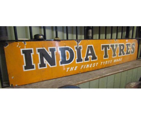 A vintage enamelled advertising sign "India Tyres" 170cm x 30cm 