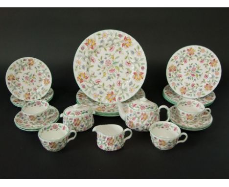 A Minton "Haddon Hall" part tea and dinner service for four, comprising tea pot, milk jug, sucrier and others