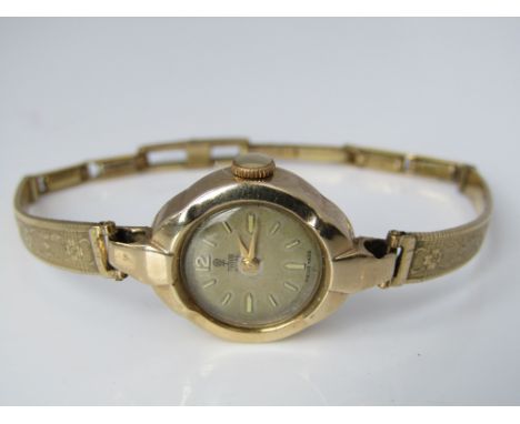 Vintage ladies 9ct Rolex Tudor wristwatch, with yellow metal floral bracelet 
