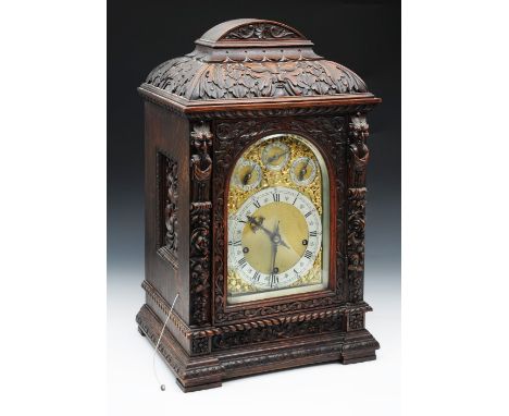 A good 19th century German three train boardroom/bracket clock by Winterhalder &amp; Hofmeier, the gilt arched dial with silv