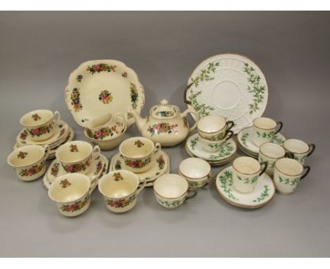 A collection of 19th century Worcester relief moulded teawares with floral detail, together with a Wedgwood floral pattern te