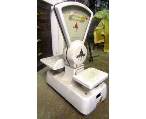 Set of vintage shop scales by Swift to weigh one pound, with white enamel finish