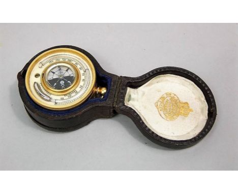 A good 19th century pocket barometer/thermometer and mother of pearl compass, by Dolland of London, with gilt metal casing an