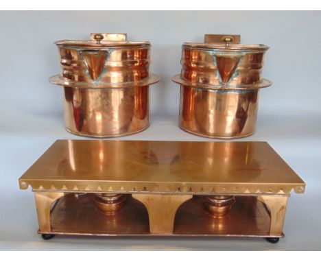 An interesting pair of antique copper and brass bain marie type vessels, the hinged lid enclosing a ceramic dish interior; to