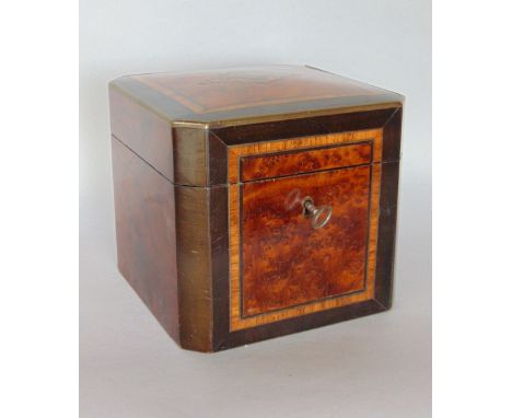 Attractive 19th century amboyna and satinwood crossbanded tea caddy, the hinged lid inlaid with brass detail, enclosing a lid