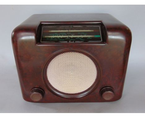 A vintage Bush Bakelite radio, 30cm long, recently serviced and in working order