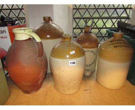 Four vintage stoneware flagons, two with merchants marks for Stroud Brewery Company Ltd and C & W Stewart wine merchants, Abe