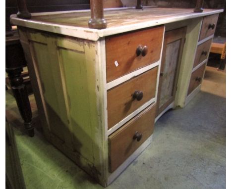 A vintage Victorian and later partially painted pine shallow inverted dresser/counter, partially enclosed by central rectangu