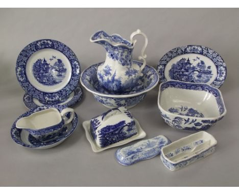 A collection of 19th century and later blue and white printed wares including a rose wreath pattern ewer, a Morea stone china