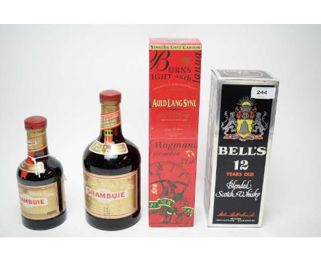 Bell's Blended Scotch Whisky, 12 Years Old, in box; Auld Lang Syne Scotch Whisky, in box; and two bottles of Drambuie liqueur