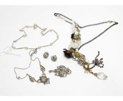 Marcasite costume jewellery: including; pendant necklace, earrings and brooch, and a faux pearl necklace.