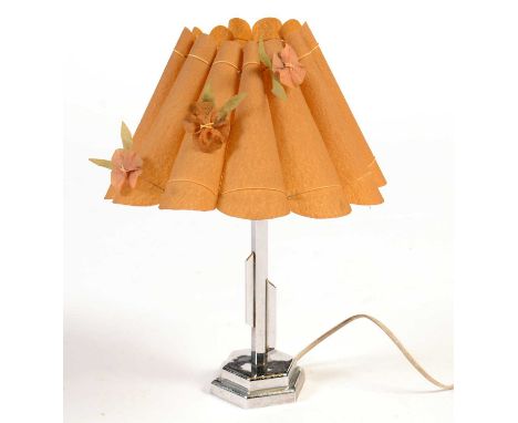 An Art Deco chromed metal table lamp, with octagonal base, original shade, 46cms high.