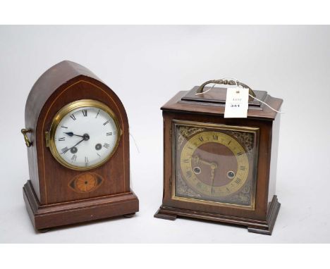 Edwardian inlaid mahogany mantel clock, the domed case with twin brass handles, 26cms high; and a Smiths Enfield mahogany man