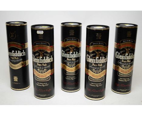 Four bottles of Glenfiddich Special Reserve Pure Malt Scotch Whisky, each in tube; and another bottle of Glenfiddich Pure Mal