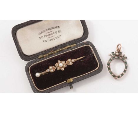 A late Victorian cased yellow-metal and seed pearl floral pattern bar brooch, and a 19th Century seed pearl, green stone, and
