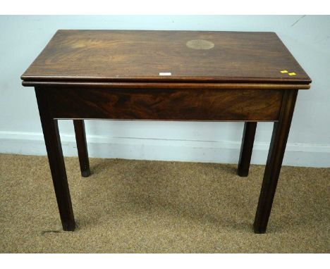 A George III mahogany tea table, with a rectangular hinged folding top opening onto a gate leg, chamfered square sectioned le