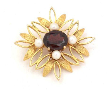 A modern garnet and cultured pearl foliate spray brooch, on 9ct gold, 8.7g gross.