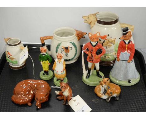 Four Gray's Pottery fox figures, each with printed mark to base, the tallest 16cms high; three various hunting jugs; two Besw