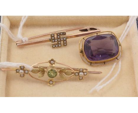 Edwardian brooches: including; a peridot and seed pearl openwork bar brooch on yellow-metal, a seed pearl Swastika bar brooch
