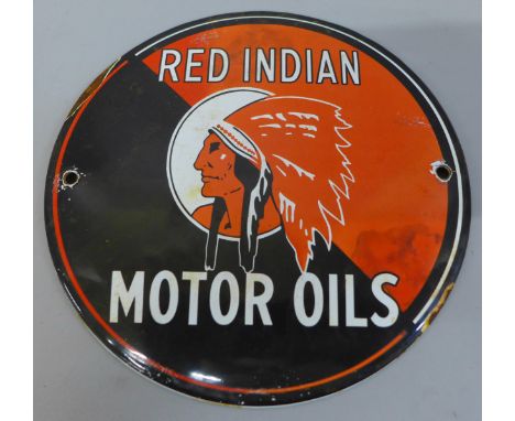A Red Indian Motor Oils circular enamel sign 
